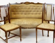 EDWARDIAN ROSEWOOD MARQUETRY SALON SUITE, comprising canape and two bergeres, chairs on castors
