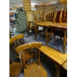 SET OF SIX STAINED BEECH SPINDLE BACK KITCHEN DINING CHAIRS and a similar kitchen dining table (7)