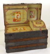 VICTORIAN DOME-TOP TRUNK with decorative pressed metal panels and clasps, fitted interior with