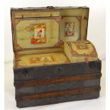 VICTORIAN DOME-TOP TRUNK with decorative pressed metal panels and clasps, fitted interior with