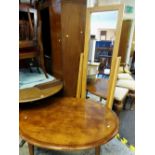 MODERN OAK CHEVAL MIRROR AND COFFEE TABLE, mirror with bevelled glass, oval oak table crossbanded,