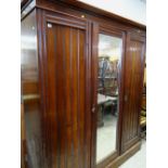 VICTORIAN TRIPLE MIRRORED WARDROBE, 183cms wide and four 17th Century-style oak dining chairs (5)