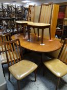 G-PLAN TEAK EXTENDING DINING TABLE & SIX CHAIRS, all with red G-Plan labels, table 162cms long (