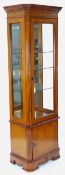 MODERN REPRODUCTION NARROW CHINA CABINET, patera-centered yew wood frieze, single-glazed door and