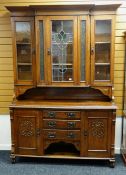 EDWARDIAN OAK HIGH DRESSER, ogee cornice above glazed and leaded cupboards, raised on chest base