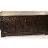 LARGE ANTIQUE JOINED OAK COFFER, PROBABLY WEST COUNTRY, lid with beaded edge, extensively carved