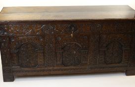 LARGE ANTIQUE JOINED OAK COFFER, PROBABLY WEST COUNTRY, lid with beaded edge, extensively carved