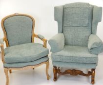 TWO REPRODUCTION ARMCHAIRS, comprising a Wiliiam & Mary-style walnut wingback armchair and a Louis