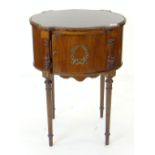 REPRODUCTION EMPIRE-STYLE GILT-METAL MOUNTED BEDSIDE CABINET, oval with outset corners, turned legs,