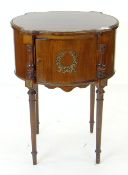 REPRODUCTION EMPIRE-STYLE GILT-METAL MOUNTED BEDSIDE CABINET, oval with outset corners, turned legs,