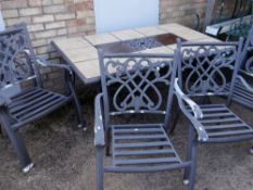MODERN ALLOY GARDEN TABLE AND SIX CHAIRS, table with inset ceramic tile top, 158cms long Condition