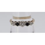 9CT GOLD FIVE STONE DIAMOND & SAPPHIRE RING, the three diamonds totalling 0.18cts approximately (