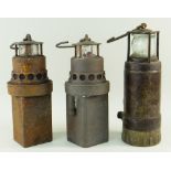 THREE VINTAGE MINERS LAMPS, comprising an Oldham Type 'F' and two International Gas Detectors Ltd (