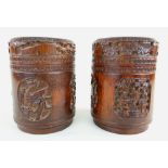 PAIR CHINESE CARVED BAMBOO TEA CANISTERS & COVERS, decorated with figures and fenghuang, 14cms