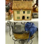 VINTAGE DOLL'S HOUSE with thatched roof and assortment of furniture (distressed), a vintage doll's