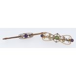 TWO 9CT GOLD BAR BROOCHES comprising Suffragette peridot, amethyst and seed pearl example together
