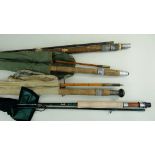 FOUR VARIOUS FISHING RODS, comprising Alcocks President 7ft 2in two piece split cane rod (corroded