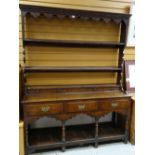 18TH CENTURY OAK WELSH DRESSER, open two-shelf Delft rack with original wrought iron hooks, on