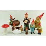 SMALL COLLECTION OF GERMAN POTTERY GNOME FIGURES including two vases shaped as an egg, a pinecone