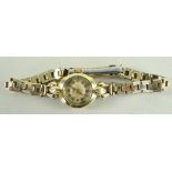 14CT GOLD J. W. BENSON LADIES WRISTWATCH having stainless steel bracelet in box