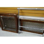 TWO MAHOGANY & BRASS GRILLED RADIATOR COVERS and a vintage steel towel radiator (3)