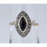 9CT GOLD SAPPHIRE & DIAMOND CLUSTER RING of marquise shape, the central sapphire surrounded by