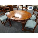 VICTORIAN-STYLE MAHOGANY EXTENDING OVAL DINING TABLE, with one extra leaf, gadrooned edge and leaf