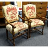 PAIR OF LOUIS XIV-STYLE OAK ARMCHAIRS, padded camel backs and stuffover seats upholstered in