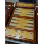 FRANKLIN MINT EXCALIBUR BACKGAMMON SET, a walnut case with inset simulated leather playing surface