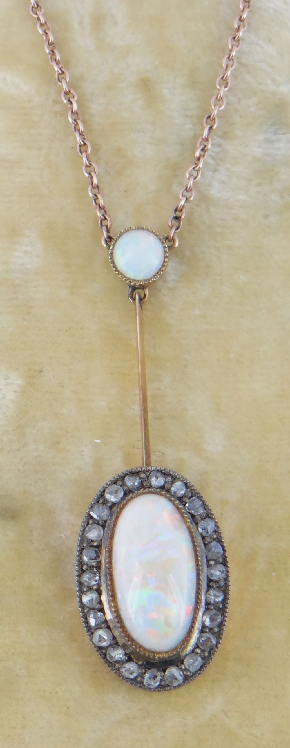 OPAL & DIAMOND CLUSTER PENDANT on 9ct gold fine link chain in period leather box, the cabochon