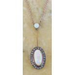 OPAL & DIAMOND CLUSTER PENDANT on 9ct gold fine link chain in period leather box, the cabochon