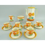 STYLISH 1930s ART DECO COFFEE SERVICE FOR SIX, boldly painted with flowers in orange, green,