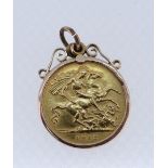 GEORGE V HALF SOVEREIGN, 1912, in 9ct gold scroll design mount, 4.9gms