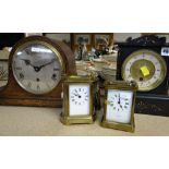 FOUR CLOCKS including a Belgian slate mantel clock, oak mantel clock retailed by J W Benson and