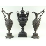 PAIR OF CAST METAL ALLOY EWERS IN THE RENAISSANCE STYLE, 44cms high and a cast metal urn and