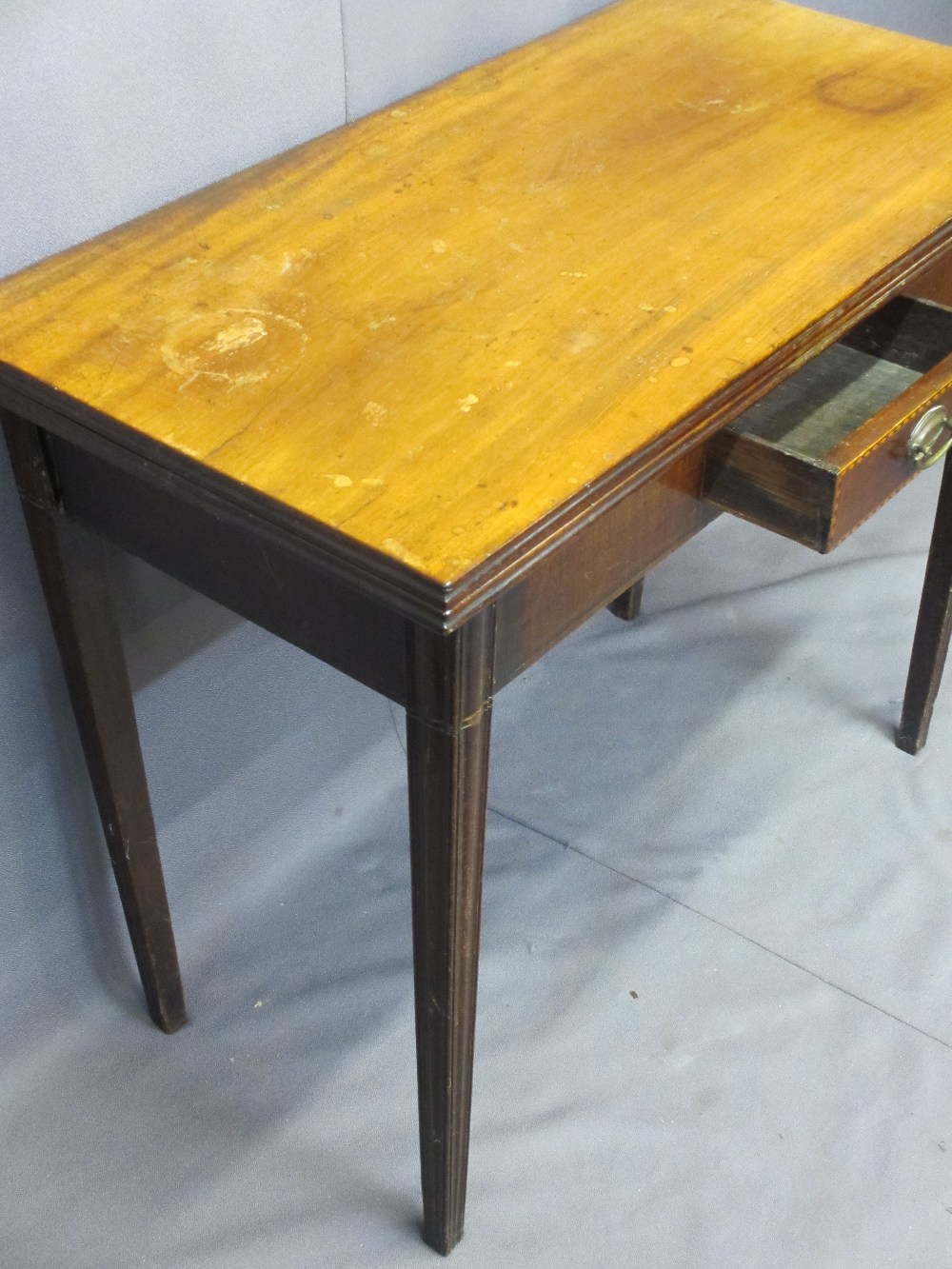 MAHOGANY FOLDOVER TEA TABLE with single drawer on tapered supports, 75cms H, 92cms W, 46cms D - Image 3 of 3