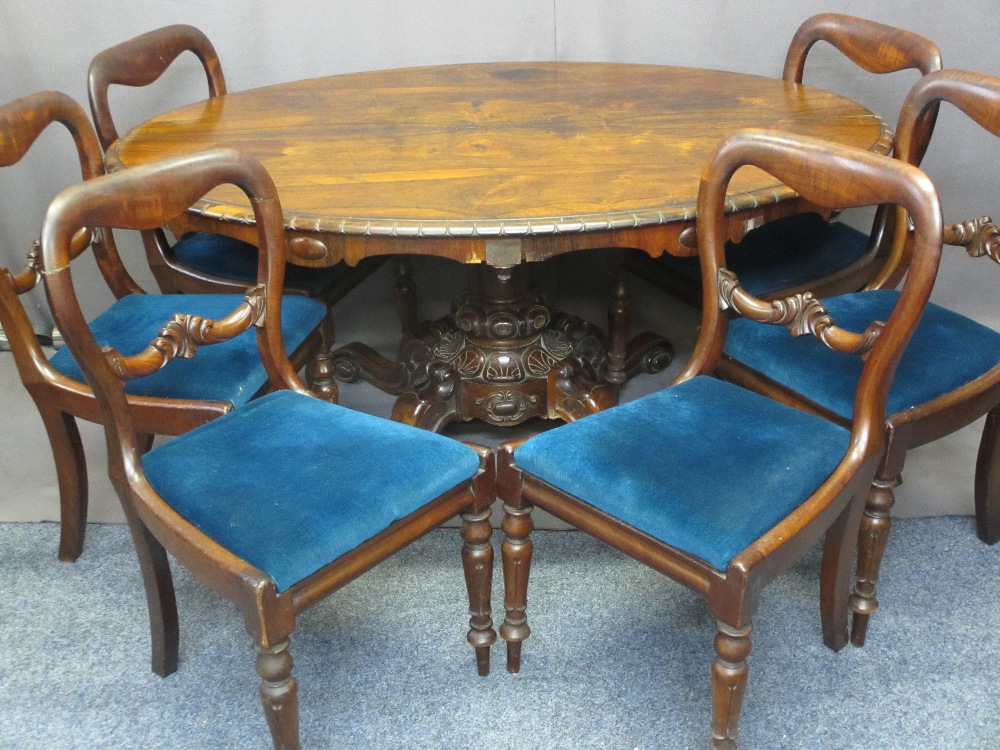 ROSEWOOD TILT-TOP BREAKFAST TABLE on central pedestal, 74cms H, 154cms W, 106cms D and six