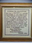 ANTIQUE WELSH SAMPLER in an oak frame 'Gweddi yr Arglwydd' 1904, overall size 65 x 65cms