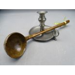 POLISHED WOODEN LADLE (PROBABLY WALNUT) and a vintage pewter chamber stick, 39cms L and 11.5cms H