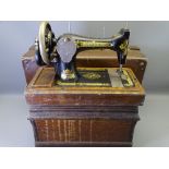 SINGER HAND CRANK SEWING MACHINE in carry case and a vintage leather effect suitcase