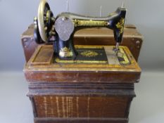 SINGER HAND CRANK SEWING MACHINE in carry case and a vintage leather effect suitcase