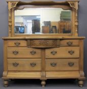 CIRCA 1900 STRIPPED WALNUT MIRROR BACK SIDEBOARD having a bevelled edge mirror flanked by turned and