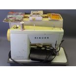 SINGER ELECTRIC SEWING MACHINE IN CARRY CASE with foot pedal E/T