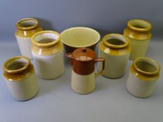 SIX VINTAGE STONEWARE HONEY POTS, a similarly style bowl and a lidded jug