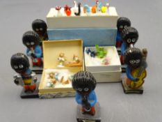SEVEN ROBERTSON GOLLY BAND MEMBER FIGURINES, animal and fruit form glass cocktail sticks and other
