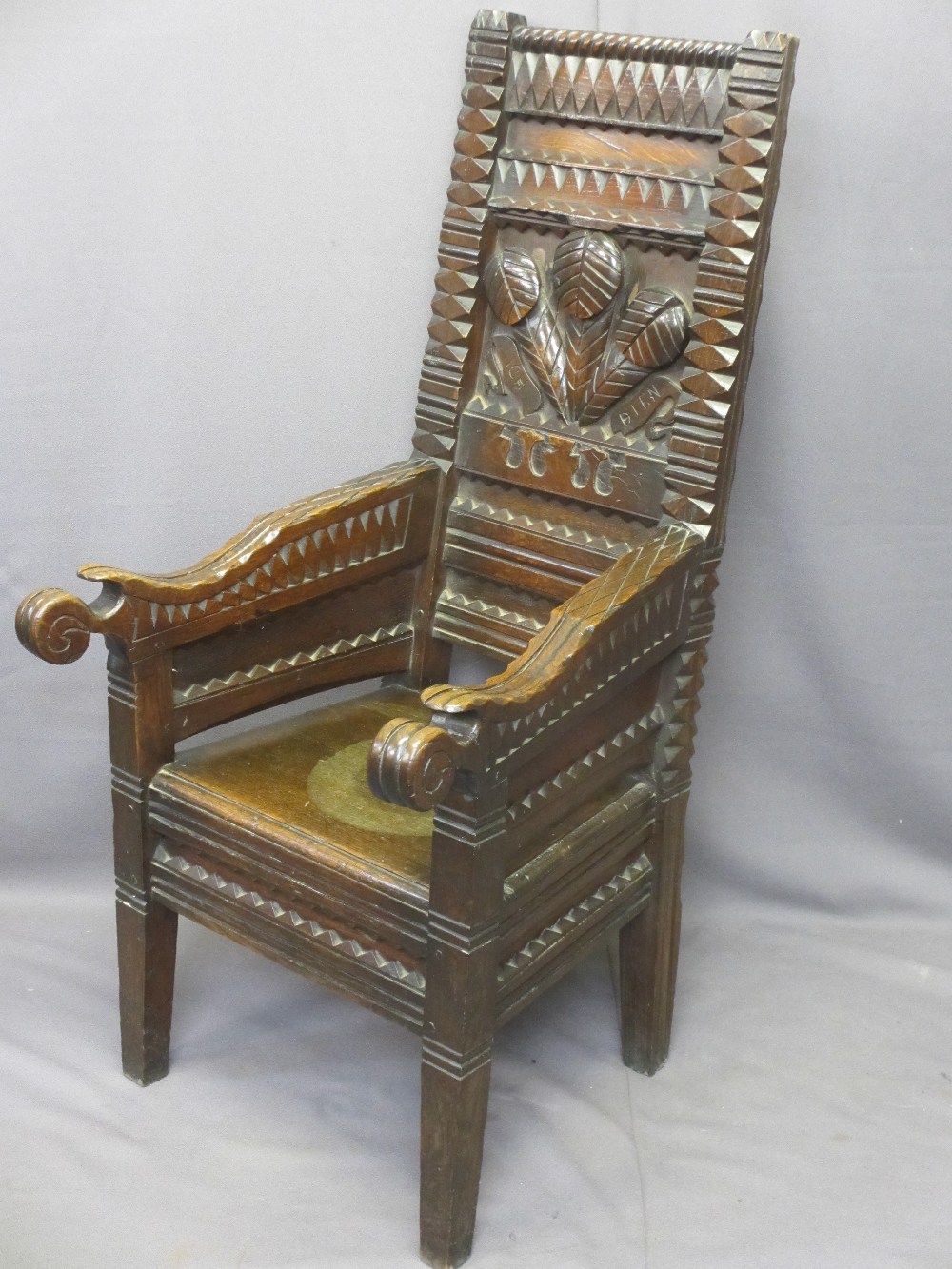 HEAVILY CARVED WELSH EISTEDDFOD TYPE CHAIR, three feathers and 'Ich Dien' carved to the back - Image 3 of 4