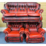 VINTAGE BUTTON BACK RED LEATHER EFFECT THREE PIECE SUITE of three seater settee and a pair of