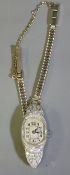 ART DECO LADY'S DIAMOND & PLATINUM WRIST WATCH on 14ct white gold bracelet strap, the case back