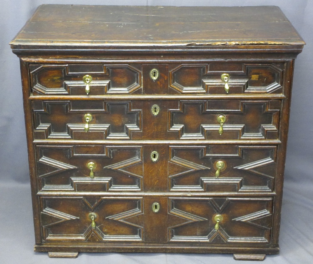 VICTORIAN JACOBETHAN CHEST of four long pine lined drawers, various patterned panels to the front,