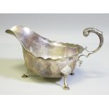 HOOF FOOTED SILVER SAUCE BOAT with C scroll handle, Birmingham 1921, Maker Williams (Birmingham)